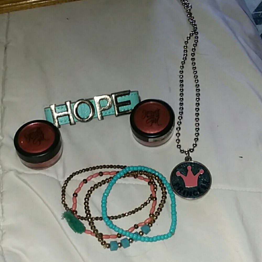 A bundle with two pink eye shadows 5 bracelet one